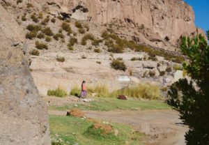 indigenous atacamena woman, walking, Caspana village, Chile, pre-Incan oasis, 3260m, steep gorge indigenous atacamena woman, walking, Caspana village, Chile, pre-Incan oasis, 3260m, steep gorge