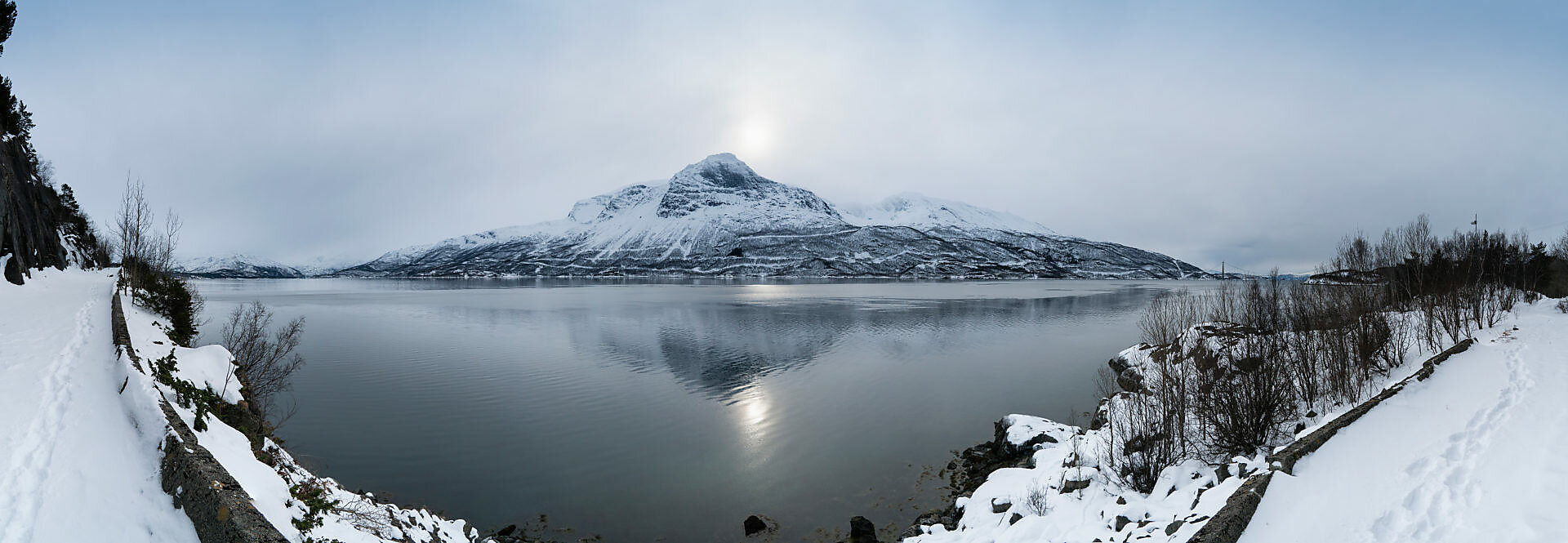 Bildagentur | mauritius images | Aerial panoramic view over campsite and  snow covered mountain range at lake Oldevatn, Norway., image size:1920x665