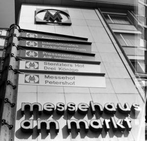 Autumn fair 1968 in Leipzig, notice board at the fair house on the market in Petersstrasse for fair visitors Autumn fair 1968 in Leipzig, notice board at the fair house on the market in Petersstrasse for fair visitors