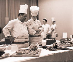 Gastronomy examination in an Interhotel in Leipzig, members of the jury examine the presentation of the prepared dishes and dishes Gastronomy examination in an Interhotel in Leipzig, members of the jury examine the presentation of the prepared dishes and dishes