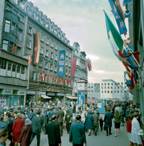 Traditional fair jewelery and hustle and bustle in the Petersstrasse in Leipzig at the Messehaus Petershof and the Filmbuehne Capitol Traditional fair jewelery and hustle and bustle in the Petersstrasse in Leipzig at the Messehaus Petershof and the Filmbuehne Capitol