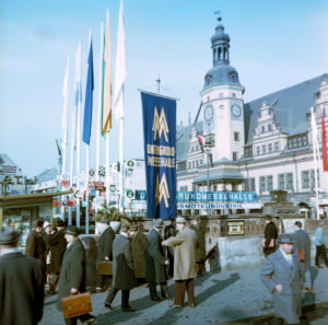 Around 1968 Leipzig at the time of the fair, hustle and bustle in the city center on the market in front of the underground fair house, behind it the Old Town Hall Around 1968 Leipzig at the time of the fair, hustle and bustle in the city center on the market in front of the underground fair house, behind it the Old Town Hall