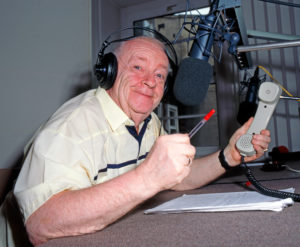 The popular Leipzig actor, cabaret artist and radio presenter Manfred Uhlig, also a loyal supporter of BSG Chemie Leipzig, moderates humorously in a Leipzig radio studio The popular Leipzig actor, cabaret artist and radio presenter Manfred Uhlig, also a loyal supporter of BSG Chemie Leipzig, moderates humorously in a Leipzig radio studio