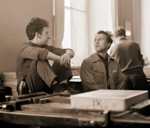 Two professors from the legendary University of Graphic and Book Art Leipzig, the painters, graphic artists, wood carvers, sculptors and sculptors Frank Ruddigkeit and Rolf Kurth, in conversation in the workshops of the HGB. Together with Klaus Schwabe, the artist collective created the bronze relief Karl-Marx-Monument in front of the university building on Karl-Marx-Platz in Leipzig as a monumental work of art. Two professors from the legendary University of Graphic and Book Art Leipzig, the painters, graphic artists, wood carvers, sculptors and sculptors Frank Ruddigkeit and Rolf Kurth, in conversation in the workshops of the HGB. Together with Klaus Schwabe, the artist collective created the bronze relief Karl-Marx-Monument in front of the university building on Karl-Marx-Platz in Leipzig as a monumental work of art.