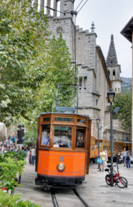 Spain, Majorca, Sóller, streetcar, church, streetcar driver, passers-by, people, pedestrian area Spain, Majorca, Sóller, streetcar, church, streetcar driver, passers-by, people, pedestrian area