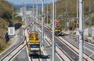 Tracks, construction vehicles, overhead line works, mechanics, work platform Tracks, construction vehicles, overhead line works, mechanics, work platform