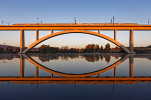 Train, bridge, lake, mirroring, morning light Train, bridge, lake, mirroring, morning light