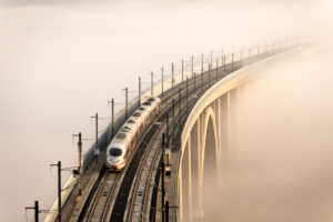 Train, overhead wire, bridge, fog Train, overhead wire, bridge, fog
