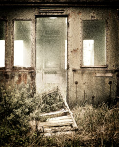 Wagon without running gear, wreck, door broken out, come down, meadow, digitally processed, RailArt Wagon without running gear, wreck, door broken out, come down, meadow, digitally processed, RailArt
