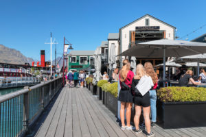 Boardwalk Seafood Restaurant on the jetty with historic steamship Earnslaw, Queenstown, Otago, South Island, New Zealand, Oceania Boardwalk Seafood Restaurant on the jetty with historic steamship Earnslaw, Queenstown, Otago, South Island, New Zealand, Oceania
