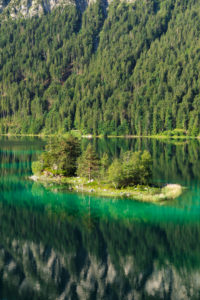 Islands in the Eibsee, near Grainau, Werdenfelser Land, Bavaria, Germany Islands in the Eibsee, near Grainau, Werdenfelser Land, Bavaria, Germany