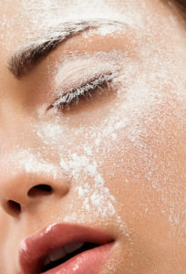 Woman, close up, powder on the eye Woman, close up, powder on the eye