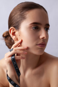Woman with measuring tape, symbol beauty, pure skin, cosmetic surgery, be perfect Woman with measuring tape, symbol beauty, pure skin, cosmetic surgery, be perfect