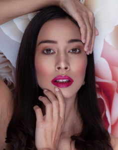 Woman, beauty, pink lips, long black hair, sensual, roses background, portrait Woman, beauty, pink lips, long black hair, sensual, roses background, portrait