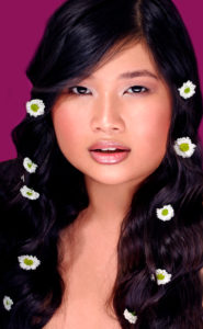 Thai girl, pink lips, long black hair, flowers, beauty, portrait Thai girl, pink lips, long black hair, flowers, beauty, portrait