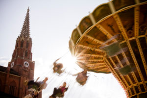 Swing carousel on a public festival, relaxed leisure time fun for Young and old Swing carousel on a public festival, relaxed leisure time fun for Young and old