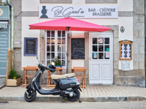 Europe, France, Brittany, Huelgoat, scooters in front of a bar Europe, France, Brittany, Huelgoat, scooters in front of a bar