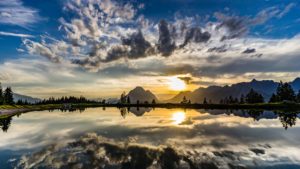 Cold water lake at sunset, Rosshütte Seefeld, Olympic region, Seefeld Plateau, Tyrol, Austria Cold water lake at sunset, Rosshütte Seefeld, Olympic region, Seefeld Plateau, Tyrol, Austria