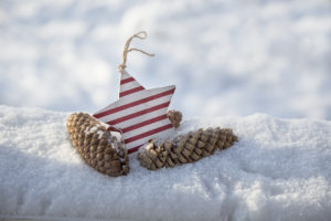 Christmas pendant in the snow, still life Christmas pendant in the snow, still life