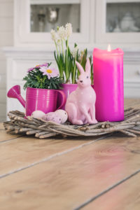 Easter still life, potted flowers and Easter bunnies, close-up, still life Easter still life, potted flowers and Easter bunnies, close-up, still life