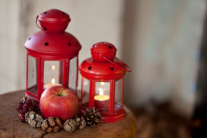 rustic winter still life with apples and lanterns rustic winter still life with apples and lanterns