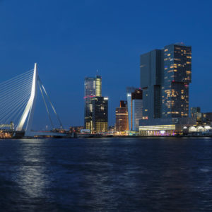 Nieuwe Maas with Erasmus Bridge and skyscrapers at blue hour, Rotterdam, South Holland, Netherlands Nieuwe Maas with Erasmus Bridge and skyscrapers at blue hour, Rotterdam, South Holland, Netherlands
