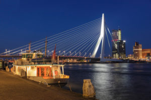 Erasmus Bridge and high-rise buildings on the Nieuwe Maas, Rotterdam, South Holland, Netherlands Erasmus Bridge and high-rise buildings on the Nieuwe Maas, Rotterdam, South Holland, Netherlands