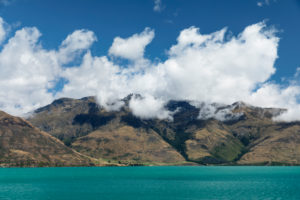 View across Lake Wakatipu to the Thomson Mountains, Queenstown, Otago, South Island, New Zealand, Oceania View across Lake Wakatipu to the Thomson Mountains, Queenstown, Otago, South Island, New Zealand, Oceania