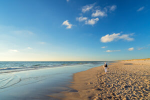 Lonely walker on the beach of Kampen, island Sylt, Schleswig-Holstein, Germany