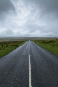 Country road in landscape, Dartmoor, Devon, South West England, England, United Kingdom, Europe Country road in landscape, Dartmoor, Devon, South West England, England, United Kingdom, Europe