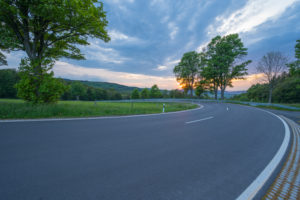 Hairpin curve, country road, sunset, spring, Reulbach, Ehrenberg, Rhön, Hesse, Germany Hairpin curve, country road, sunset, spring, Reulbach, Ehrenberg, Rhön, Hesse, Germany
