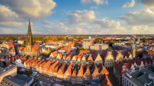 Panorama of the old town of Münster, Germany with Prinzipalmarkt and St. Lambert church Panorama of the old town of Münster, Germany with Prinzipalmarkt and St. Lambert church