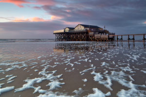 Germany, Schleswig - Holstein, North Frisia, Eiderstedt, Sankt Peter-Ording, sundown on the beach of Sankt Peter-Ording, Germany, Schleswig - Holstein, North Frisia, Eiderstedt, Sankt Peter-Ording, sundown on the beach of Sankt Peter-Ording,