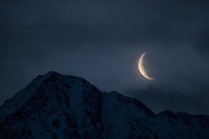 Crescent moon above the Hocheder in Tyrol Crescent moon above the Hocheder in Tyrol