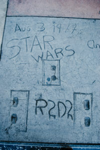 USA, California, Los Angeles, Hollywood Boulevard, Starwar's characters hand and shoe prints of R2D2 at Grauman's Chinese Theater USA, California, Los Angeles, Hollywood Boulevard, Starwar's characters hand and shoe prints of R2D2 at Grauman's Chinese Theater