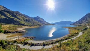 Road at the lake, Lake Hawea, along, New Zealand Road at the lake, Lake Hawea, along, New Zealand