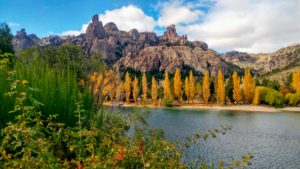 Lake in autumnal landscape with mountains and trees in Argentina Lake in autumnal landscape with mountains and trees in Argentina