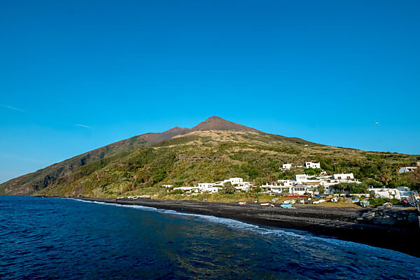 https://img.mauritius-images.com/BLOS/cprev/10325080.jpg/save_as_name/mauritius%20images%20-%2010325080%20-%20View%20from%20Stromboli%20to%20Stromboli%20volcano%2C%20Stromboli%2C%20Aeolian%20Islands%2C%20Aeolian%20Islands%2C%20Tyrrhenian%20Sea%2C%20Southern%20Italy%2C%20Europe%2C%20Sicily%2C%20Italy.jpg