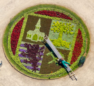 Aerial view of Schloss Berge with baroque garden and bed with city emblem of Gelsenkirchen with gardener who works in the flowerbed with the help of a ladder in Gelsenkirchen in the Ruhrgebiet in North Rhine-Westphalia in Germany, Gelsenkirchen, Ruhrgebiet, North Rhine-Westphalia, Germany Aerial view of Schloss Berge with baroque garden and bed with city emblem of Gelsenkirchen with gardener who works in the flowerbed with the help of a ladder in Gelsenkirchen in the Ruhrgebiet in North Rhine-Westphalia in Germany, Gelsenkirchen, Ruhrgebiet, North Rhine-Westphalia, Germany