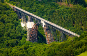 Aerial view of the railway bridge Müngstener Bridge formerly Kaiser Wilhelm Bridge is the highest railway bridge in Germany over the Wupper is being renovated in Solingen in the German state of North Rhine-Westphalia, Germany, Rhineland, Europe, Germany's highest railway bridge, historic railway bridge, iron bridge Aerial view of the railway bridge Müngstener Bridge formerly Kaiser Wilhelm Bridge is the highest railway bridge in Germany over the Wupper is being renovated in Solingen in the German state of North Rhine-Westphalia, Germany, Rhineland, Europe, Germany's highest railway bridge, historic railway bridge, iron bridge