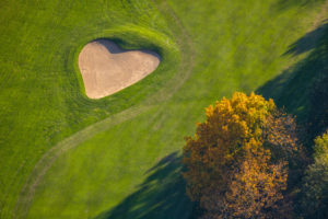 Aerial view, a heart shape on the golf course Sauerland Neheim-Hüsten, Hüsten, Arnsberg, Sauerland, North Rhine-Westphalia, Germany Aerial view, a heart shape on the golf course Sauerland Neheim-Hüsten, Hüsten, Arnsberg, Sauerland, North Rhine-Westphalia, Germany