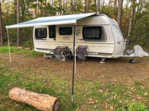 Caravan on a nature campsite Caravan on a nature campsite