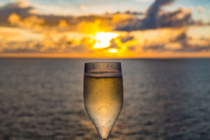 Champagne glass, sunset with storm clouds, near Reunion Island, France, Africa, Indian Ocean Champagne glass, sunset with storm clouds, near Reunion Island, France, Africa, Indian Ocean