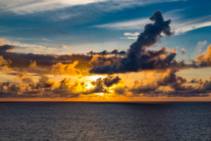 Sunset with storm clouds, near Reunion Island, France, Africa, Indian Ocean Sunset with storm clouds, near Reunion Island, France, Africa, Indian Ocean