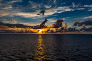 Sunset with storm clouds, near Reunion Island, France, Africa, Indian Ocean Sunset with storm clouds, near Reunion Island, France, Africa, Indian Ocean