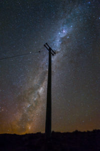 Electrical overhead line with Milky Way in the background, Tekapo, Canterbury, New Zealand Electrical overhead line with Milky Way in the background, Tekapo, Canterbury, New Zealand