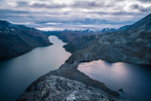 View from the Besseggen ridge to the lakes Bessvatnet and Gjende in the evening light, Jotunheimen, Norway View from the Besseggen ridge to the lakes Bessvatnet and Gjende in the evening light, Jotunheimen, Norway