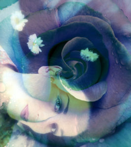 Romantically dreamy Portait of a woman with blue rose and flowers