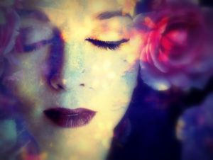 dreamy close up portrait of a women's look with flowers
