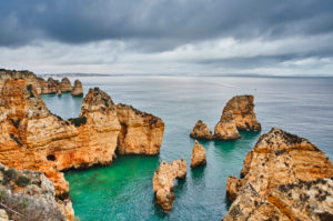 Europe, Portugal, Algarve, Litoral, Barlavento, Felsalgarve, District Faro, Lagos, Ponta da Piedade, lagoon with cliffs and distant view Europe, Portugal, Algarve, Litoral, Barlavento, Felsalgarve, District Faro, Lagos, Ponta da Piedade, lagoon with cliffs and distant view